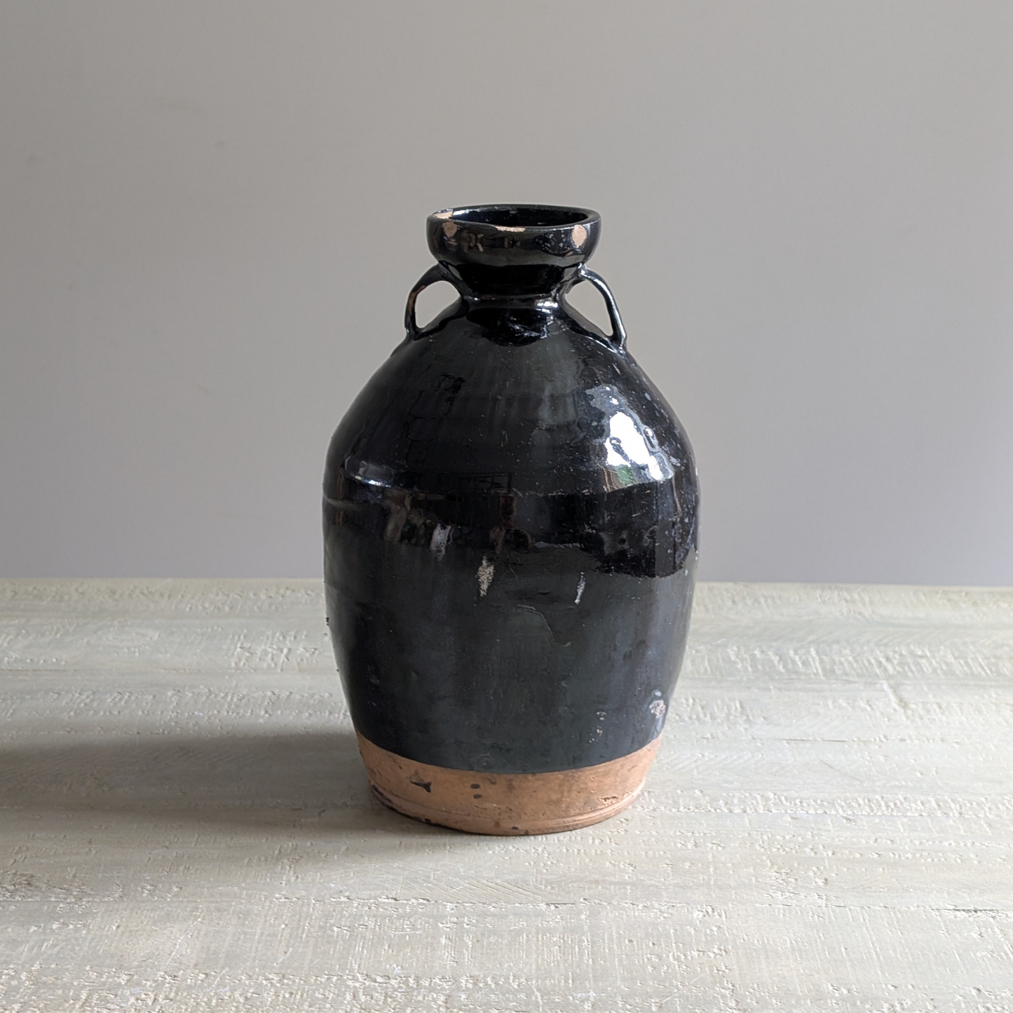 Large Black Chinese Handled Bottle