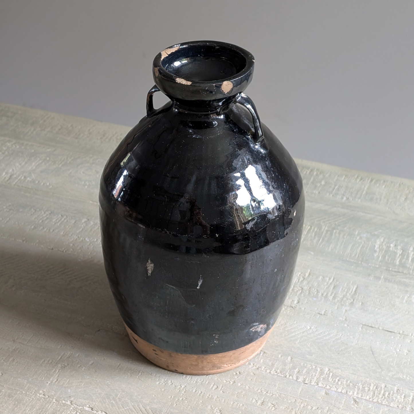 Large Black Chinese Handled Bottle