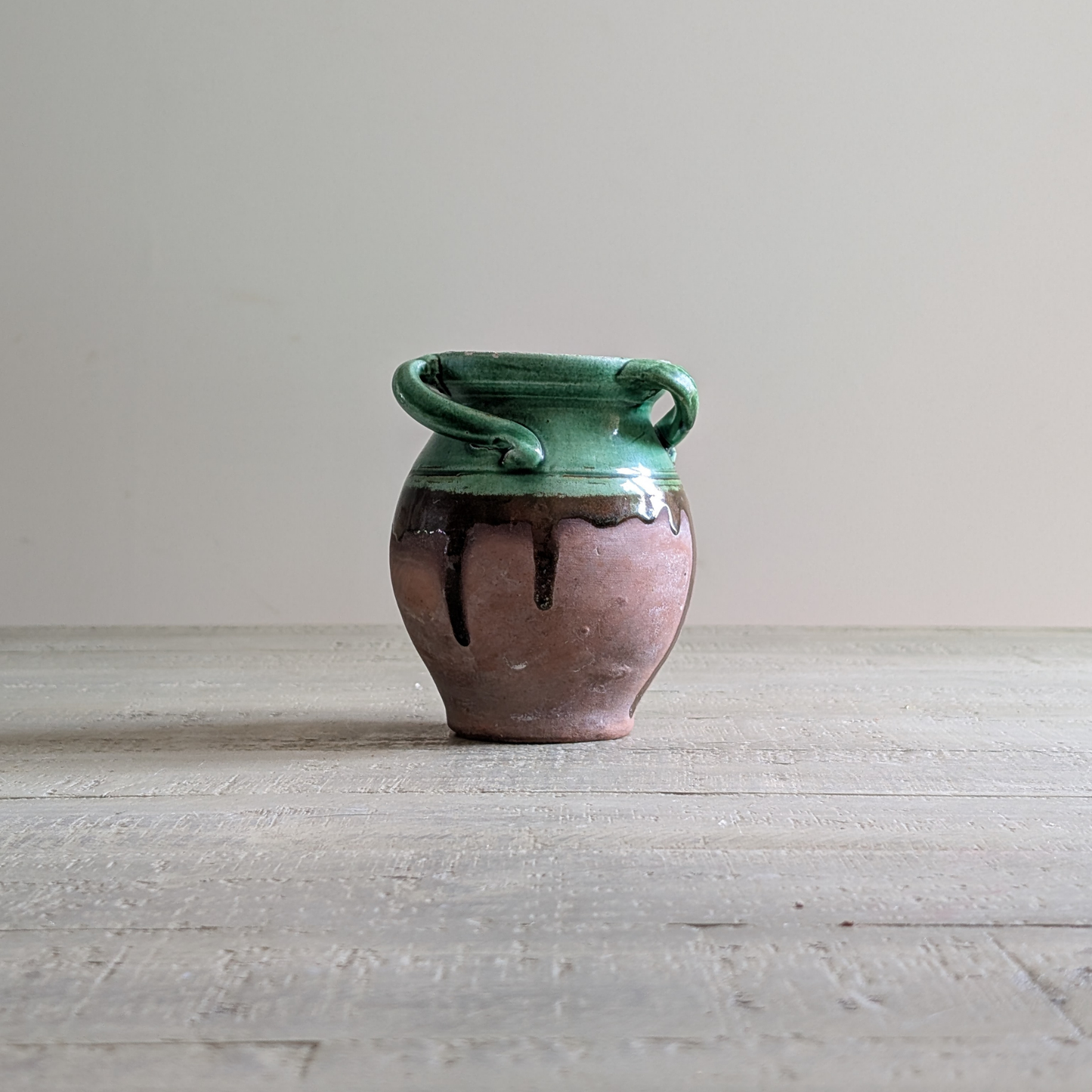 Small Green Glazed Twisted Handle Pot