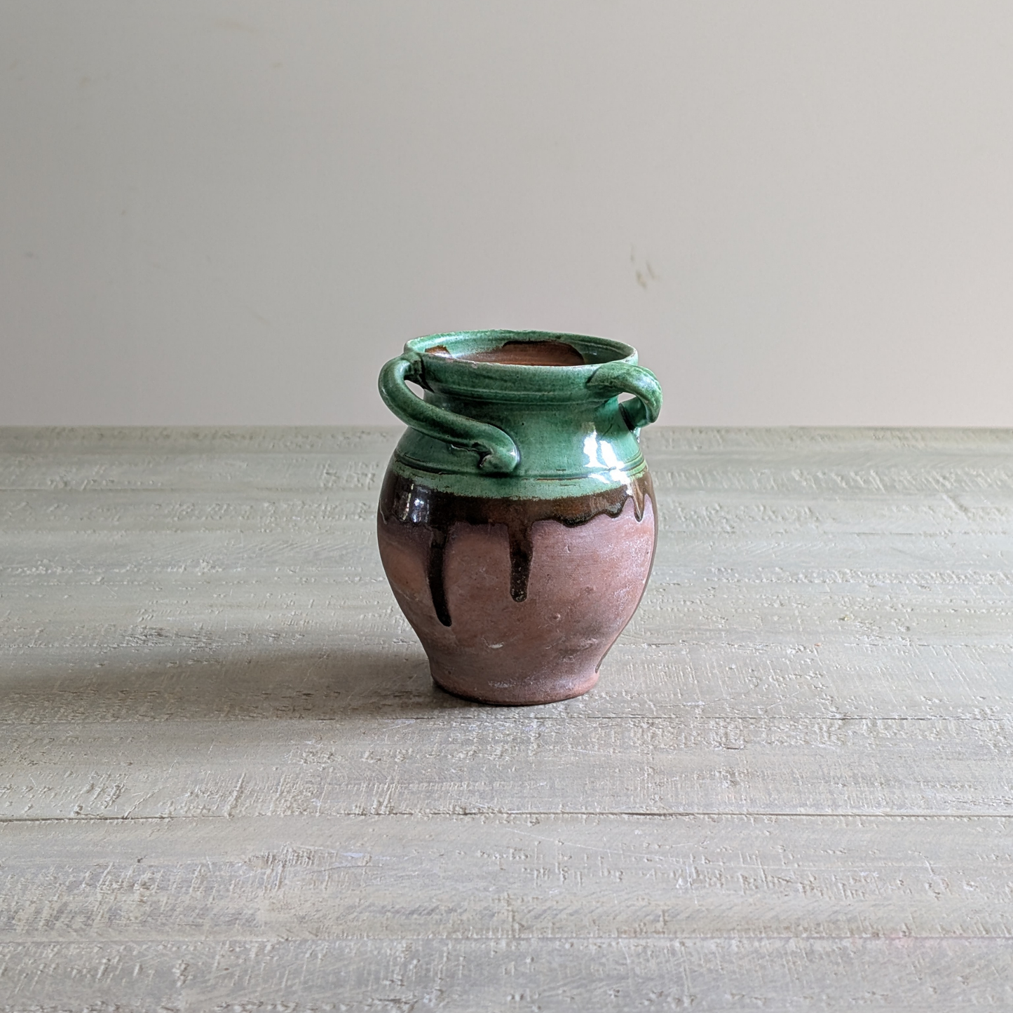Small Green Glazed Twisted Handle Pot