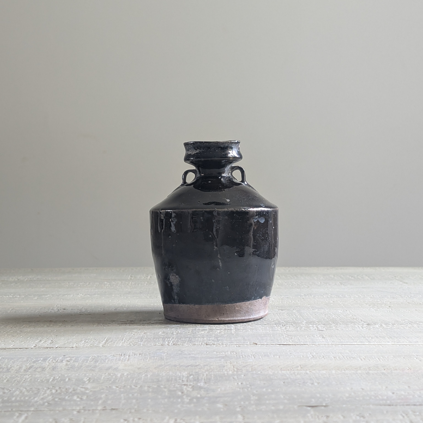 Black Chinese Handled Bottle