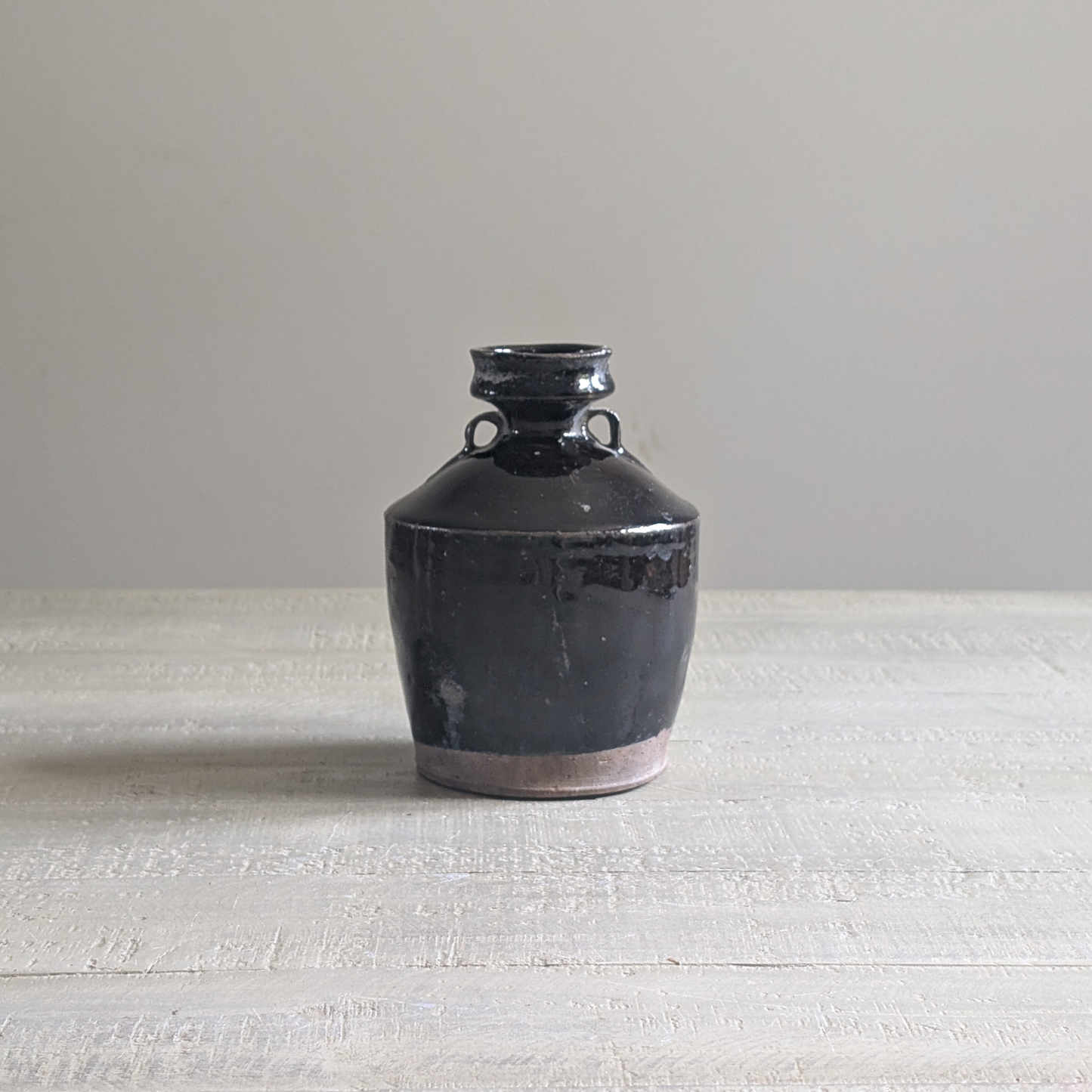 Black Chinese Handled Bottle