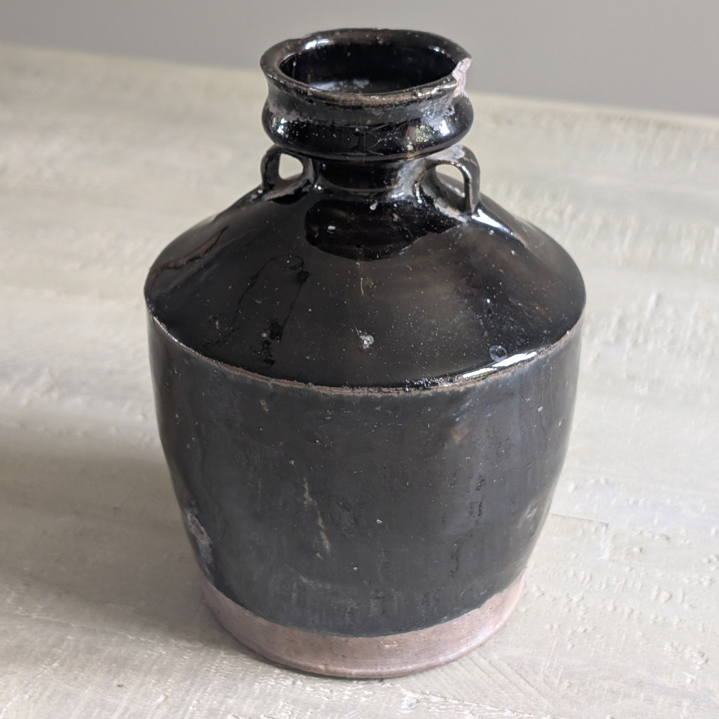 Black Chinese Handled Bottle
