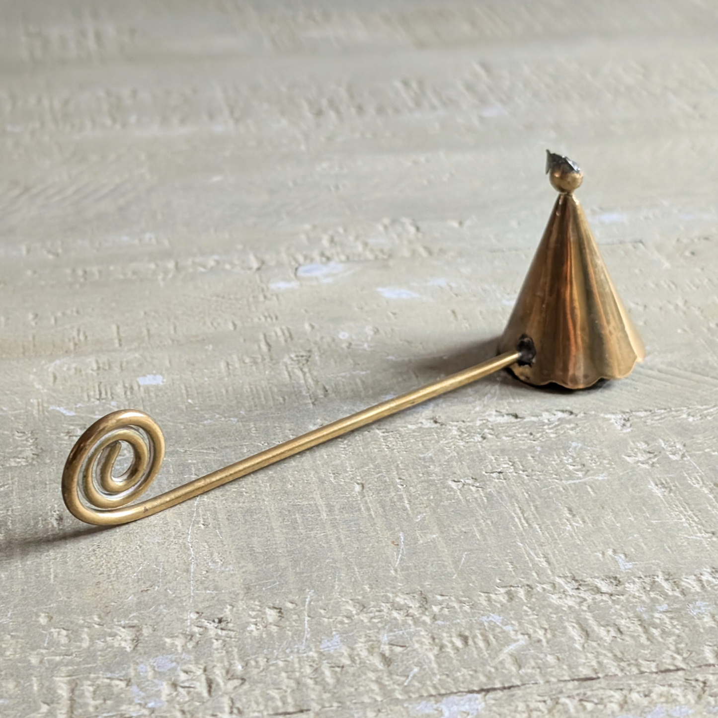 Curly Brass Candle Snuffer