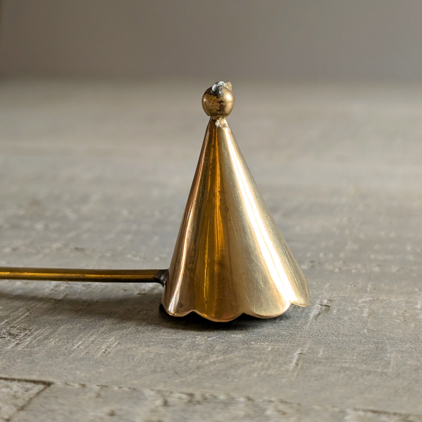 Curly Brass Candle Snuffer