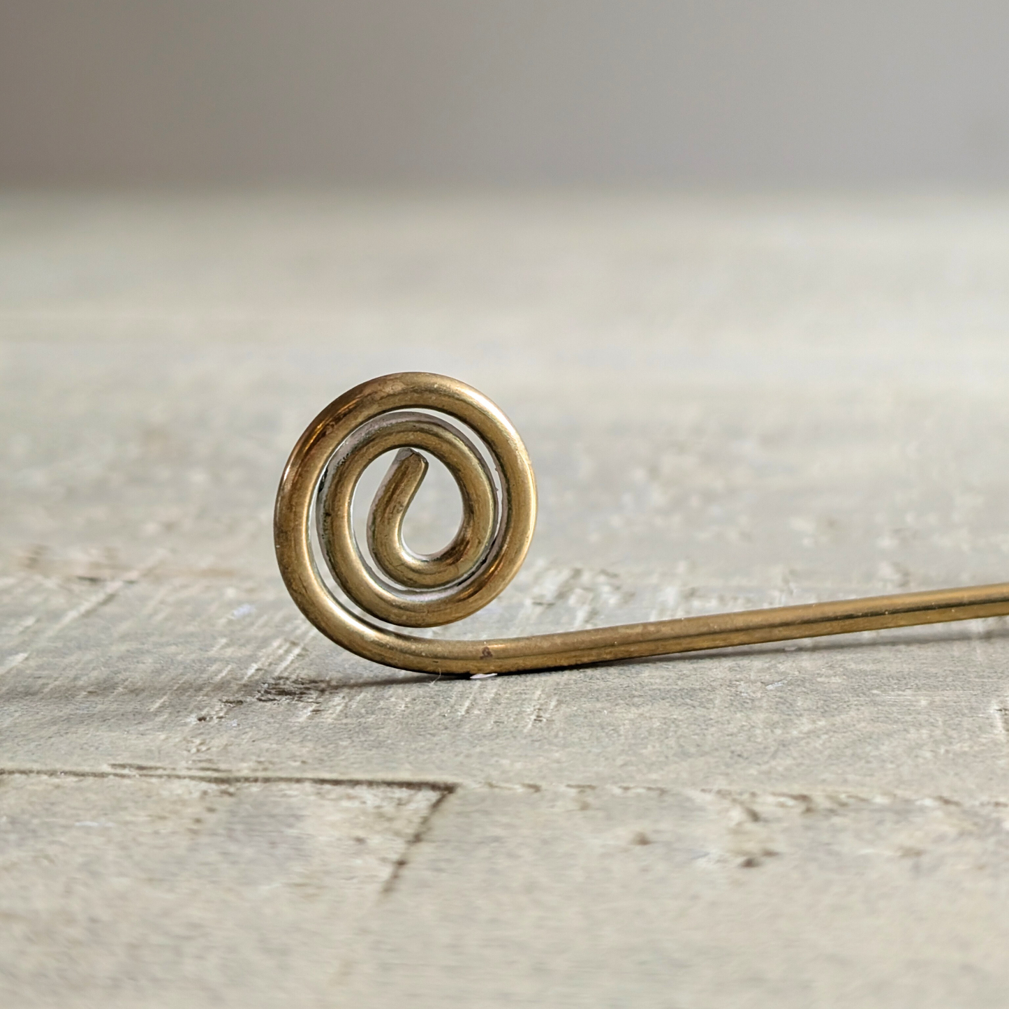 Curly Brass Candle Snuffer