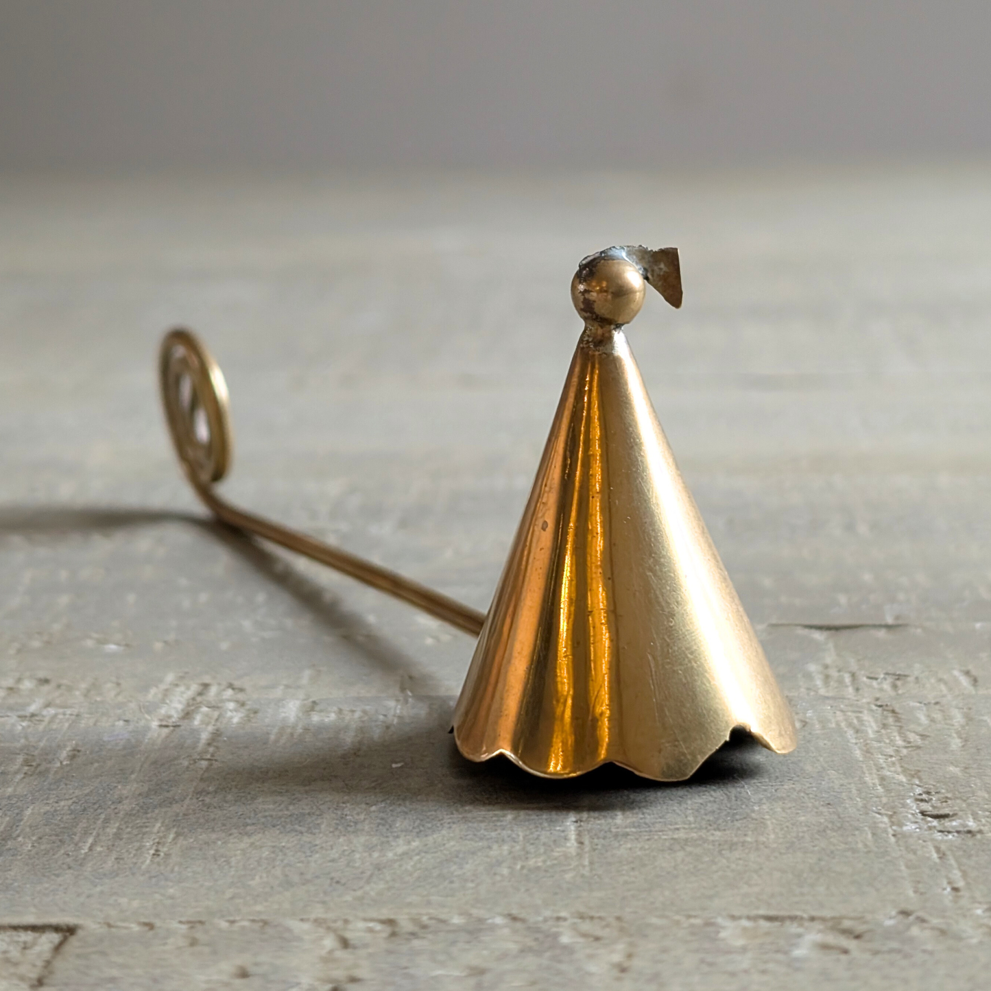 Curly Brass Candle Snuffer