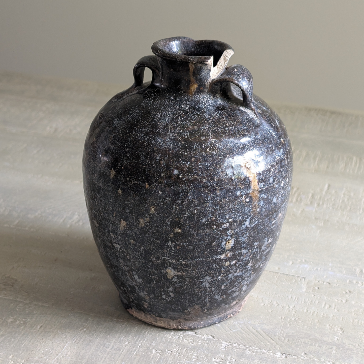 Small Black Chinese Handled Bottle