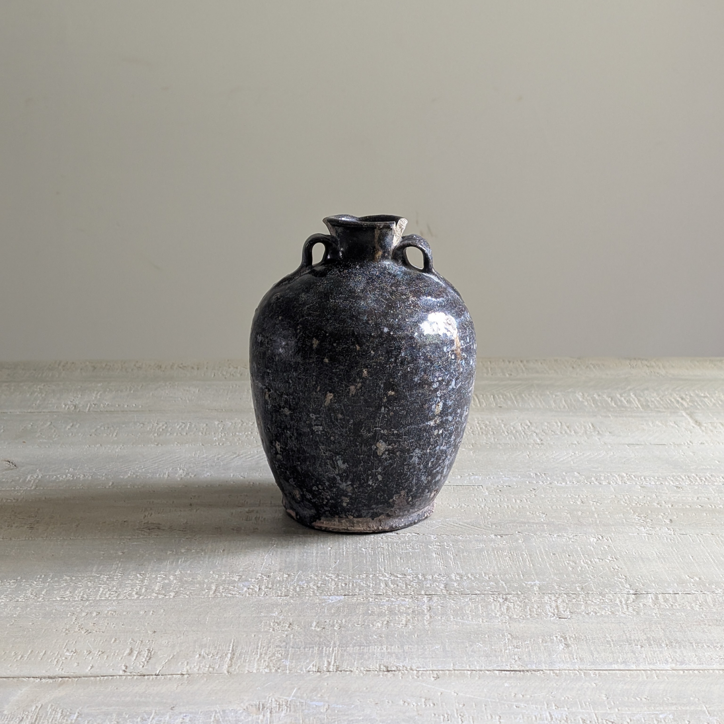 Small Black Chinese Handled Bottle